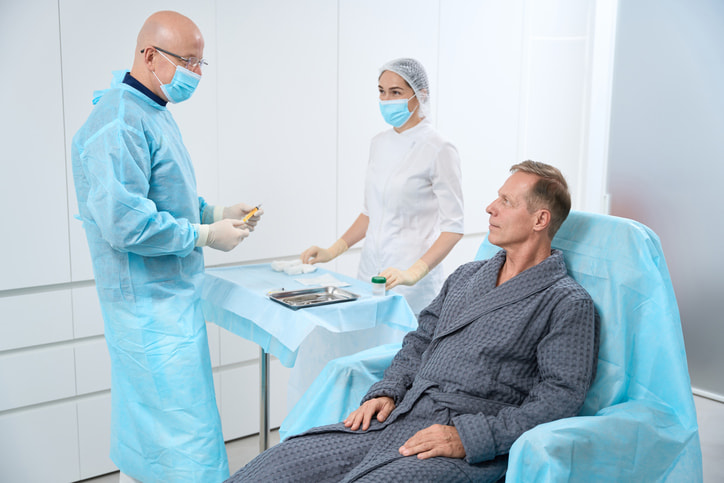 Dermatologist discussing Mohs surgery preparation with a patient in Fort Collins & Loveland, CO